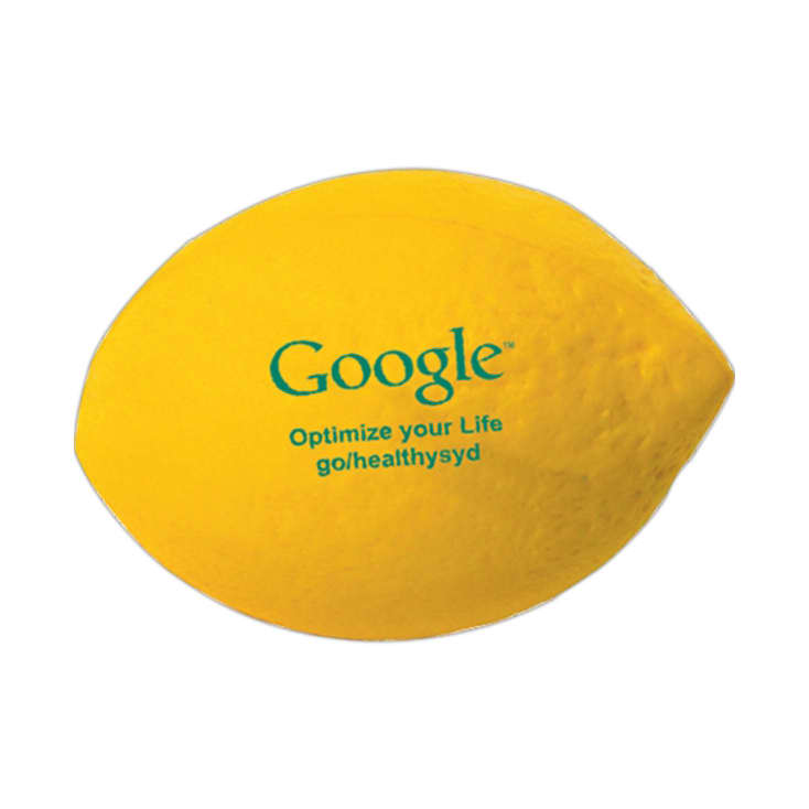 A yellow lemon-shaped stress reliever with a logo and text on its surface.