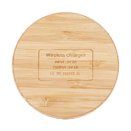 A round bamboo wireless charger with a smooth surface and a logo on it, featuring natural wood tones.