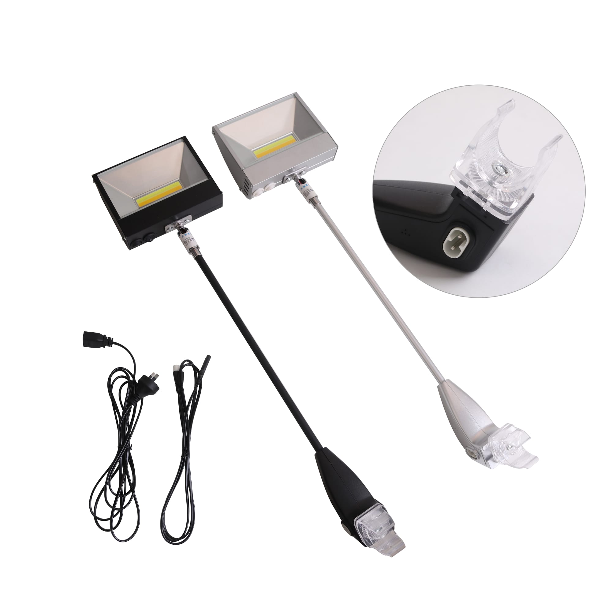 Two portable exhibit display lights in black and silver, featuring adjustable arms and connected cables for illumination.