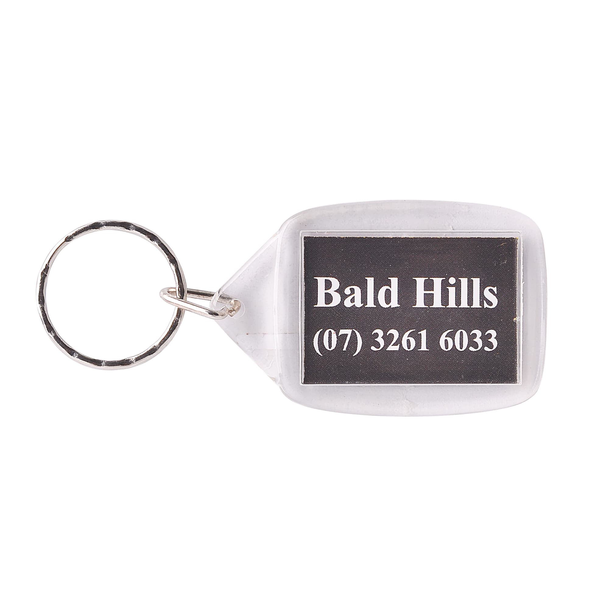 A rectangular acrylic keyring in clear colour featuring a silver keyring attachment.