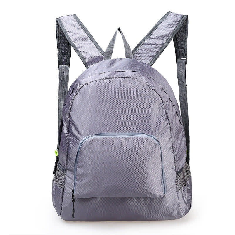 A grey backpack featuring adjustable straps and a front zip pocket, made from lightweight material.