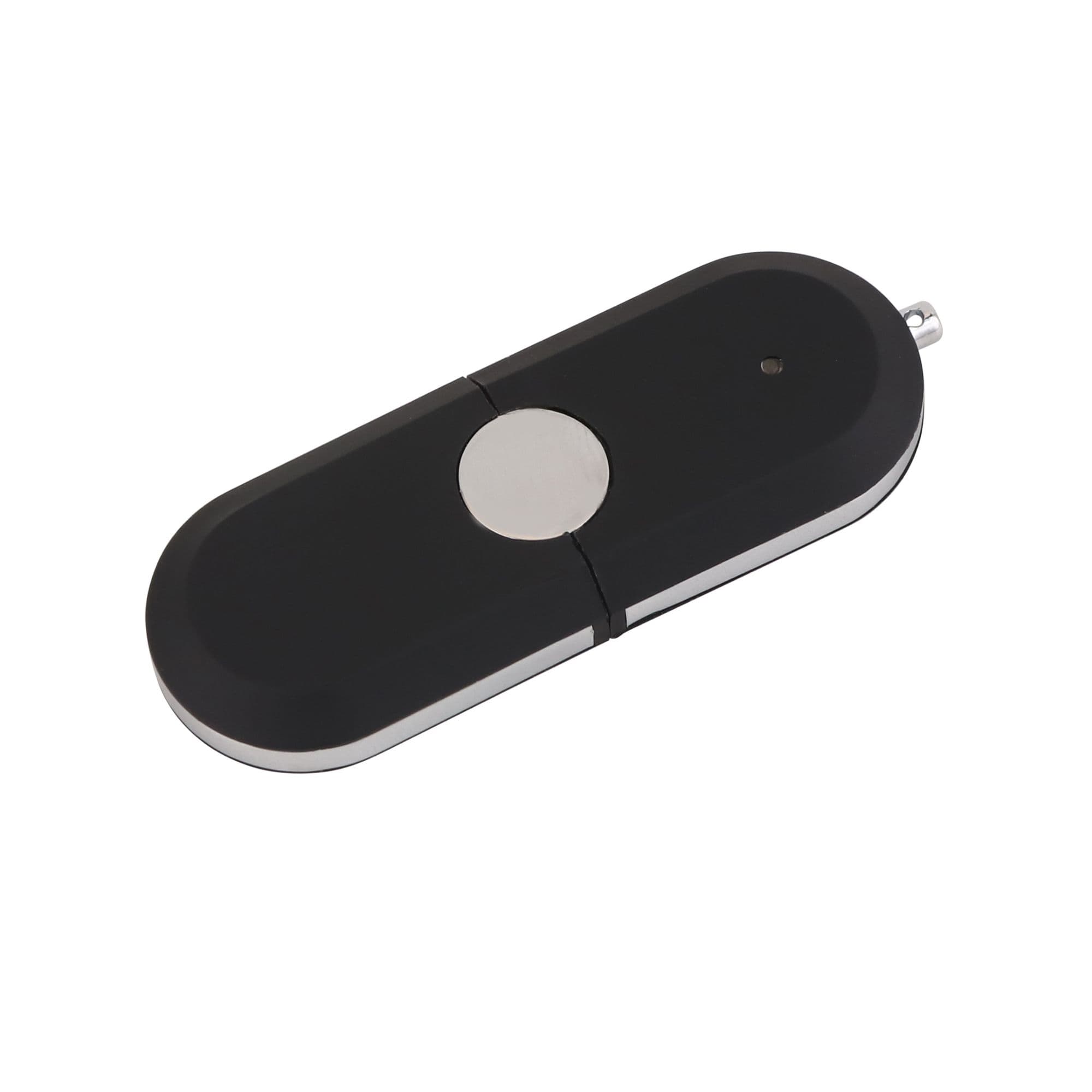 A black and silver Tauris flash drive with a circular button and a keychain loop.