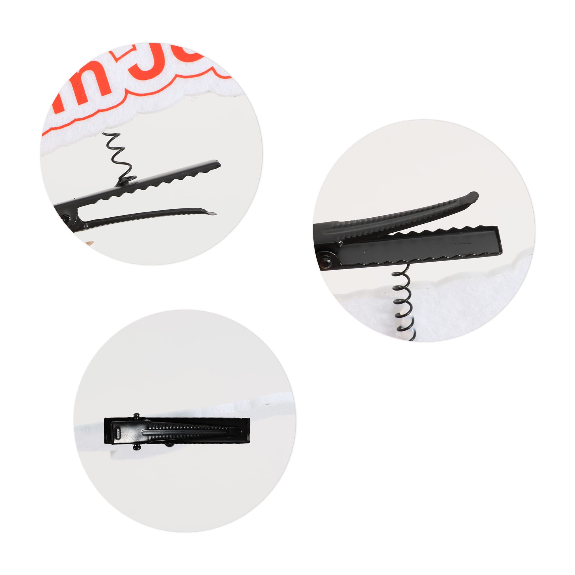 A custom felt spring hair clip in black, featuring a spiral design and textured gripping surfaces.