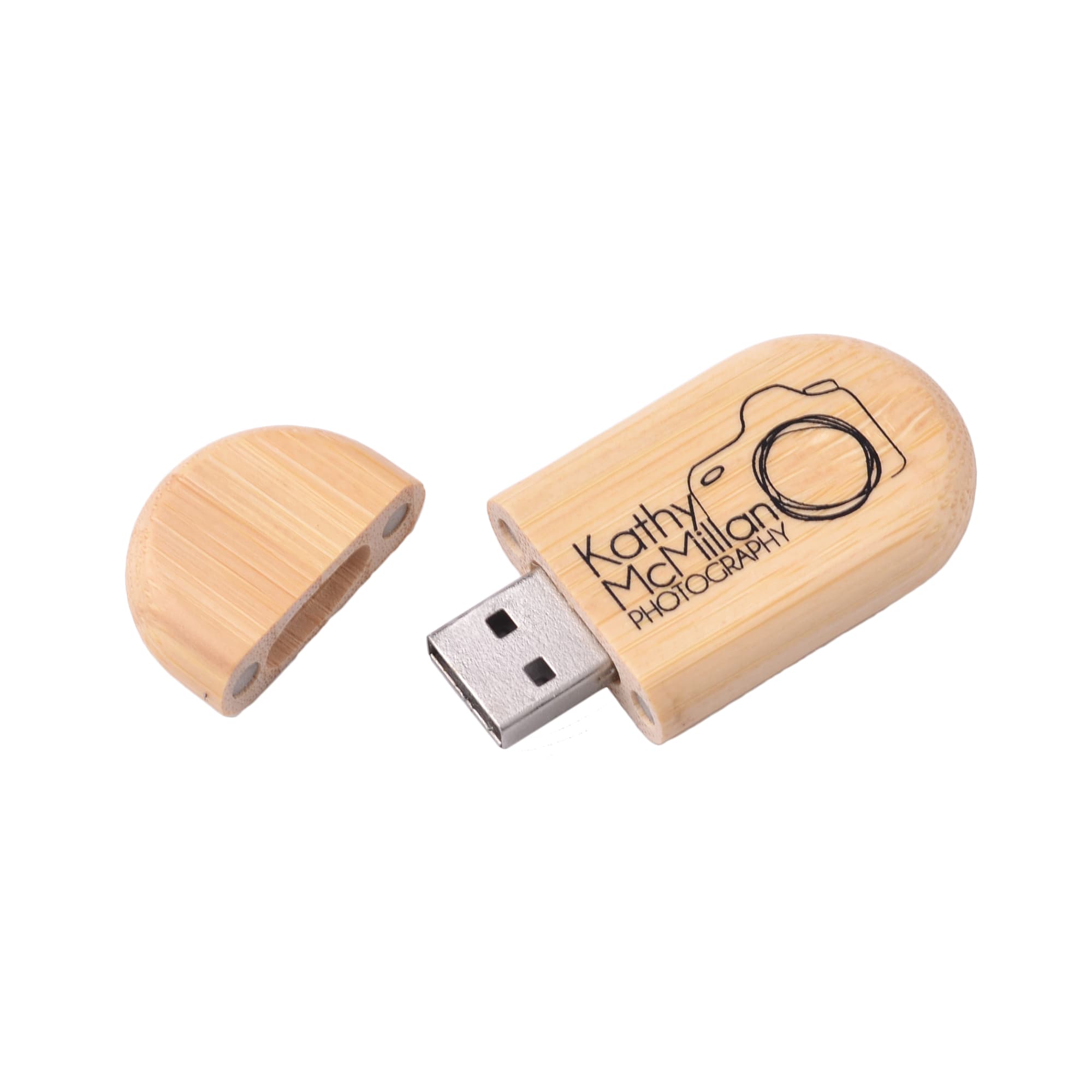An oblong wood flash drive in natural wood colour with a removable cap and a logo engraved on the surface.