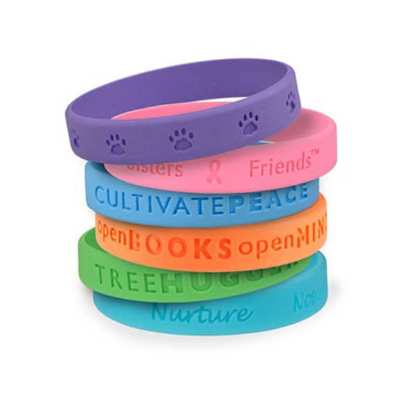 A collection of silicone debossed wristbands in purple, pink, orange, green, and blue, featuring various designs and a logo.