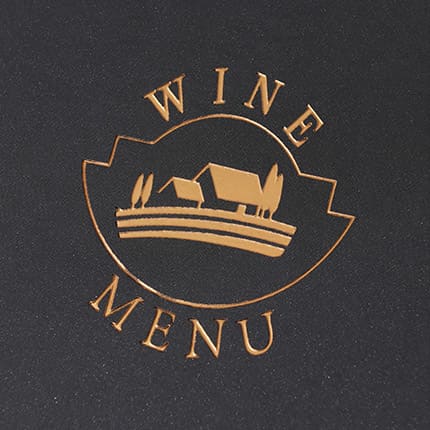 A black menu cover features a gold logo depicting a landscape with houses, labelled “Wine Menu”.