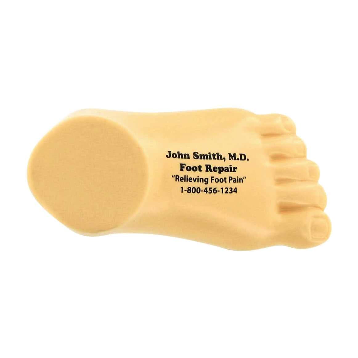 A yellow leg-shaped stress reliever with a rounded base, featuring a logo and contact information.