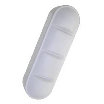 A large, white tablet-shaped stress reliever with three horizontal grooves, featuring a logo.