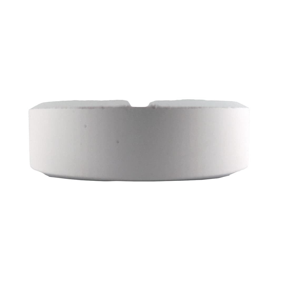 A round white tablet-shaped stress reliever with a smooth surface and a slight indentation.