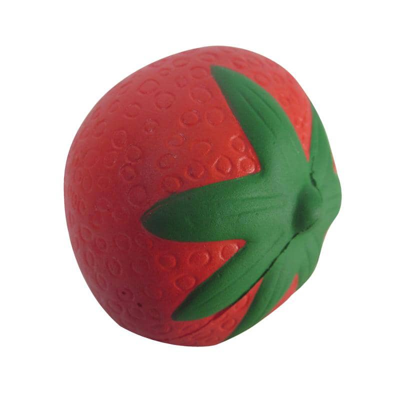 A red strawberry-shaped stress reliever with green leaves, featuring a textured surface for grip.