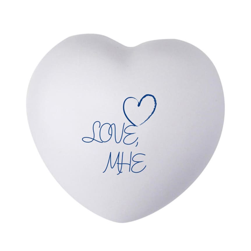 A large white heart-shaped stress reliever with blue text and a heart graphic. It features a logo.