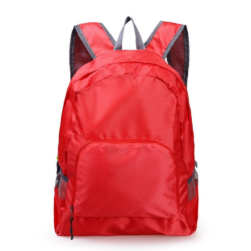 A red backpack with mesh side pockets and adjustable straps, featuring a front zip pocket and a logo.