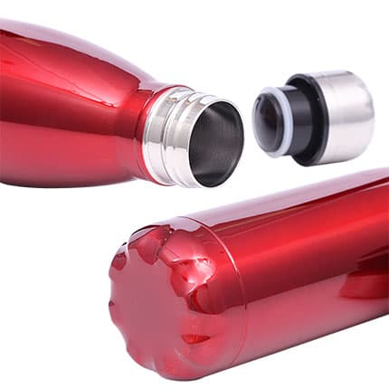 A drink bottle in bright red stainless steel with a double wall design and a detachable lid.