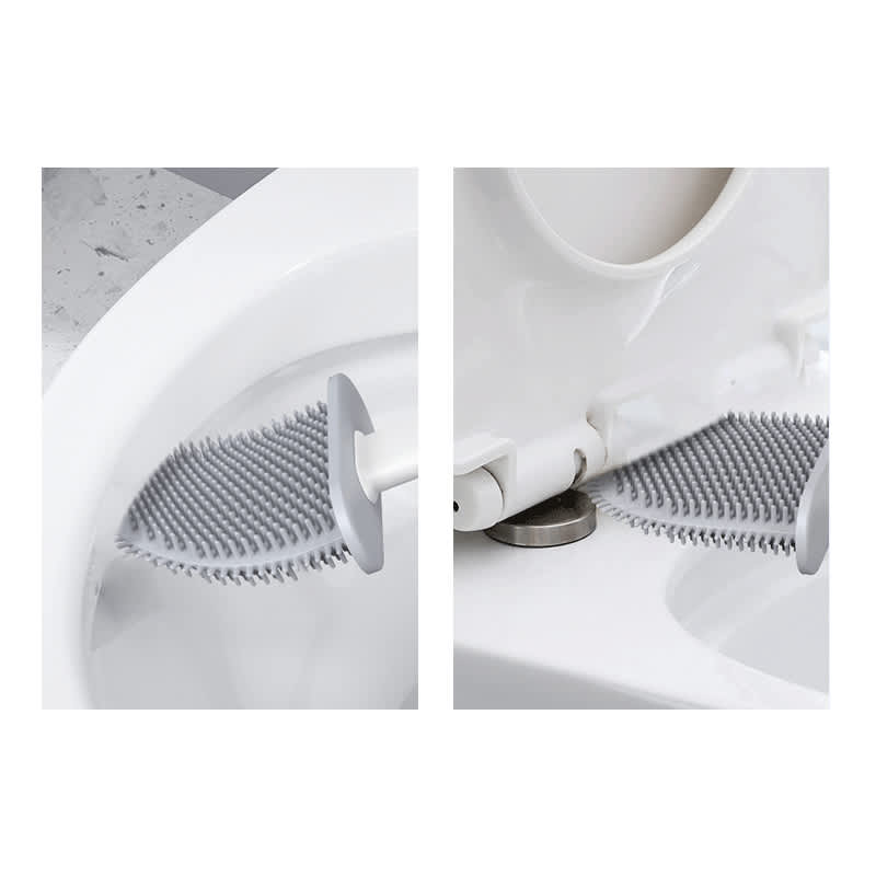 A silicone toilet brush in grey with a textured head, mounted against a white toilet bowl.