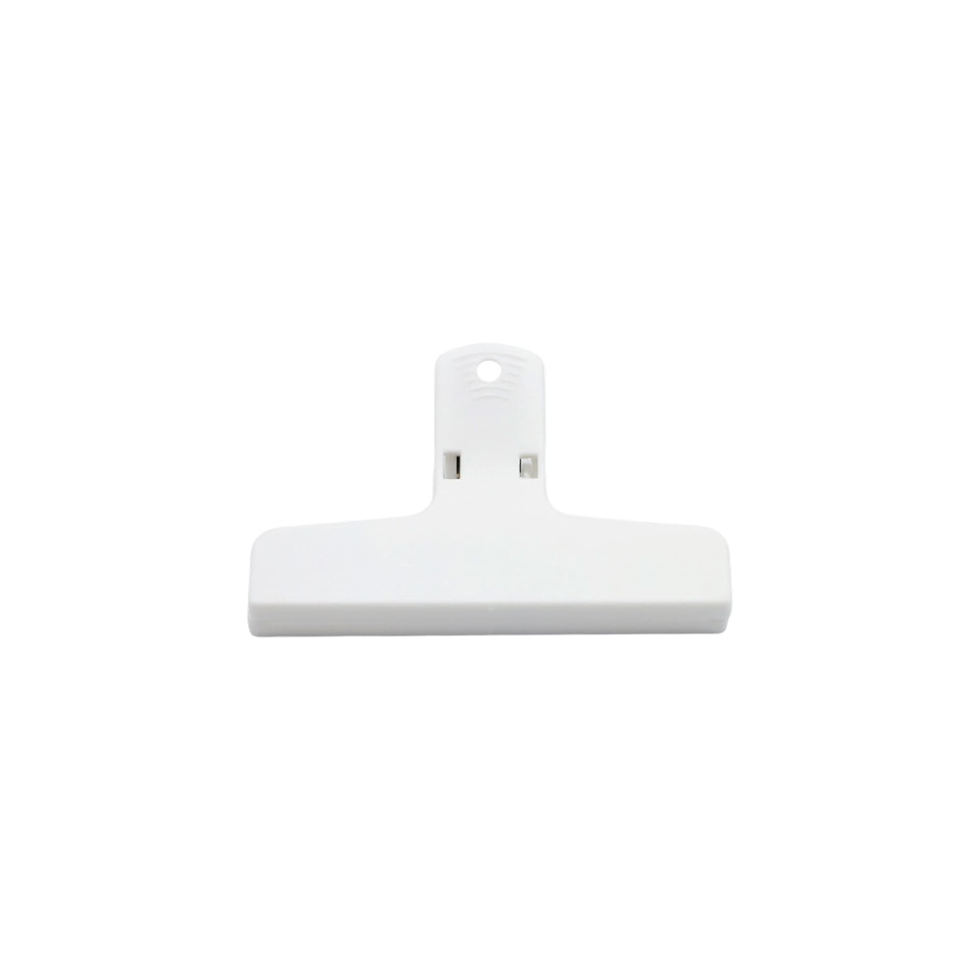 A white plastic magnetic clip with a flat gripping surface and a hole for hanging, featuring a logo.