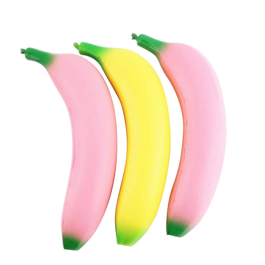 A collection of three banana-shaped stress relievers in pink and yellow colours with green tips.