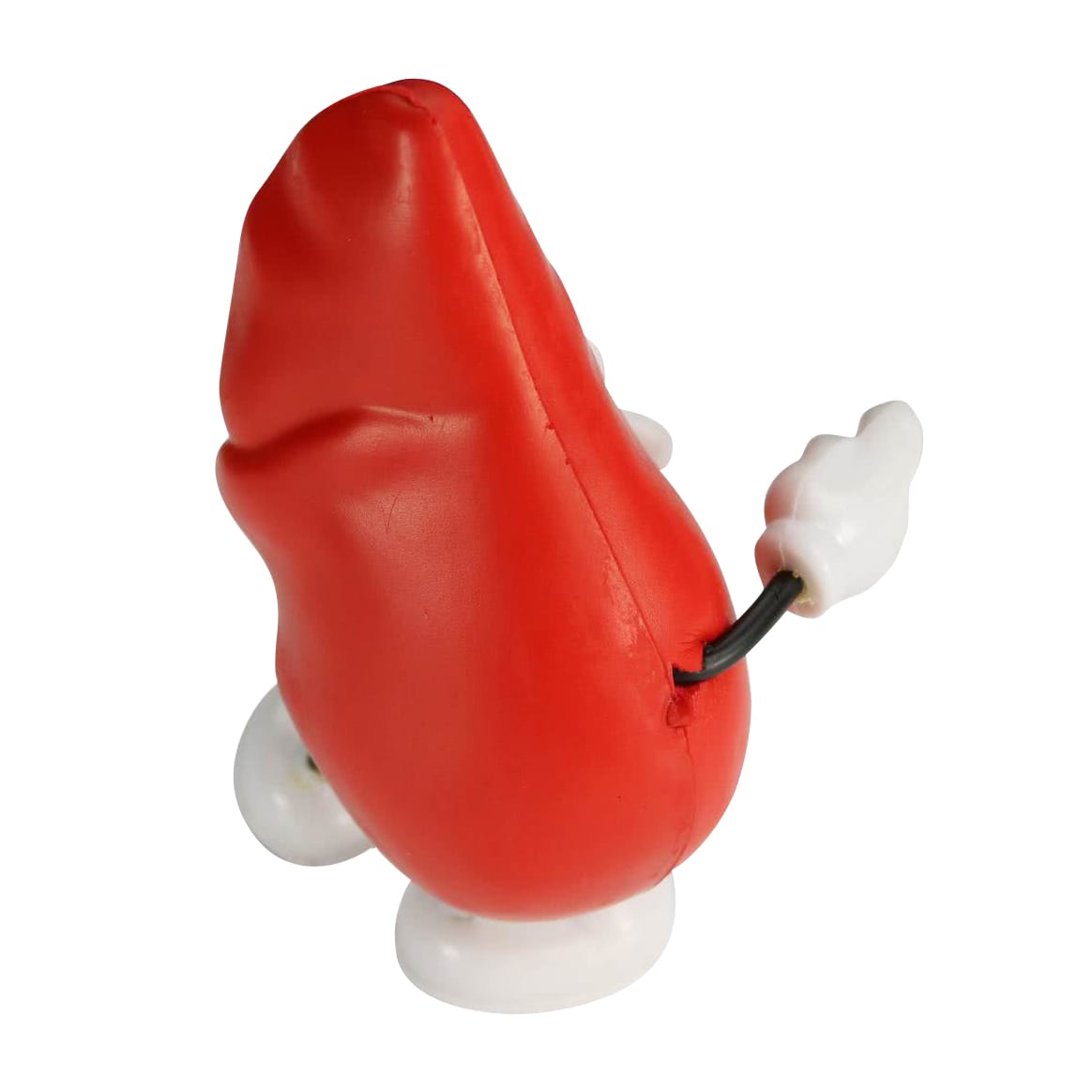 A red stress reliever shaped like a liver, with white hands and feet, positioned at an angle.