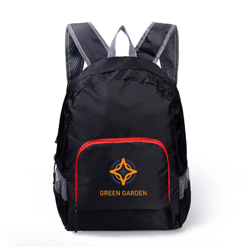 A black backpack with a red zipper pocket and a logo on the front. The straps are grey.