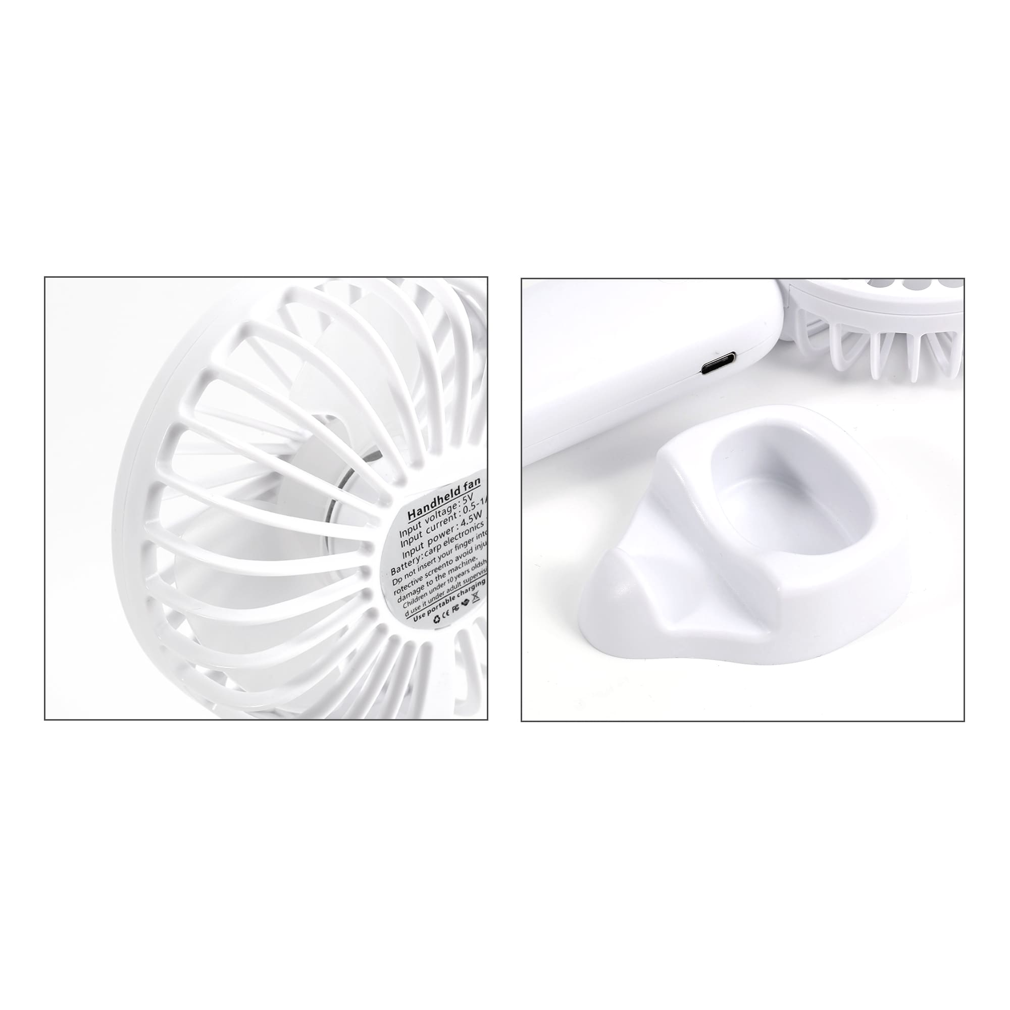 A white handheld fan with a built-in phone stand and a USB charging port. It features a logo on the handle.