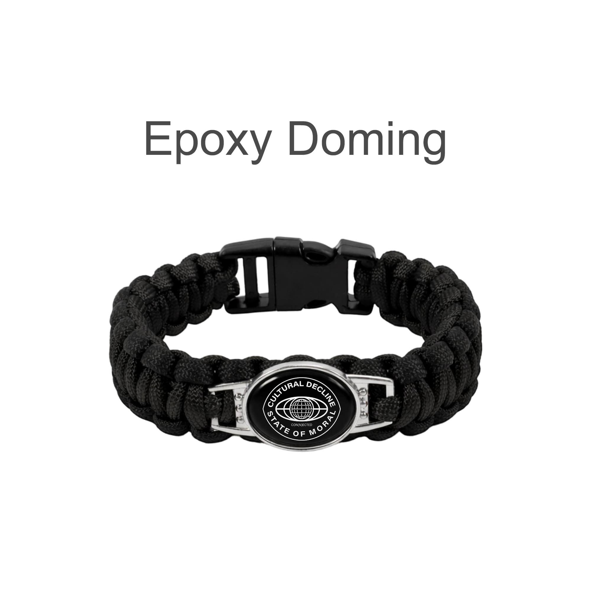 A braided black paracord bracelet featuring a themed pendant and a clasp closure, with a logo on the pendant.