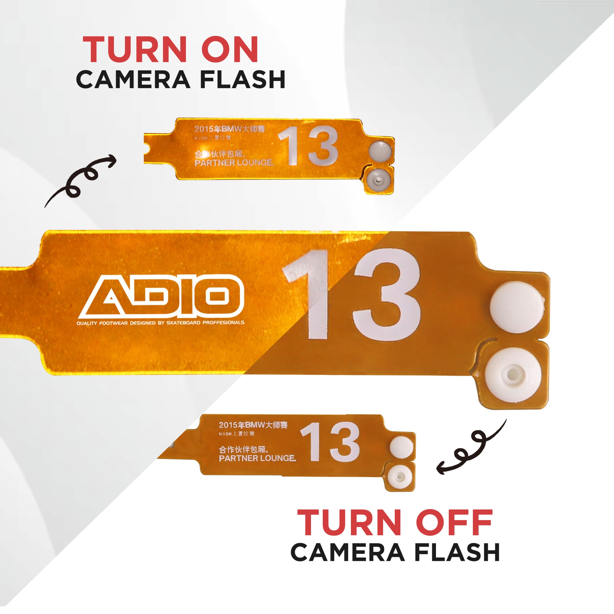 A collection of orange reflective PVC wristbands, featuring white buttons and a logo.