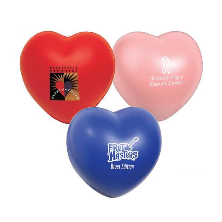 Three heart-shaped stress relievers in red, pink, and blue, each featuring a logo.