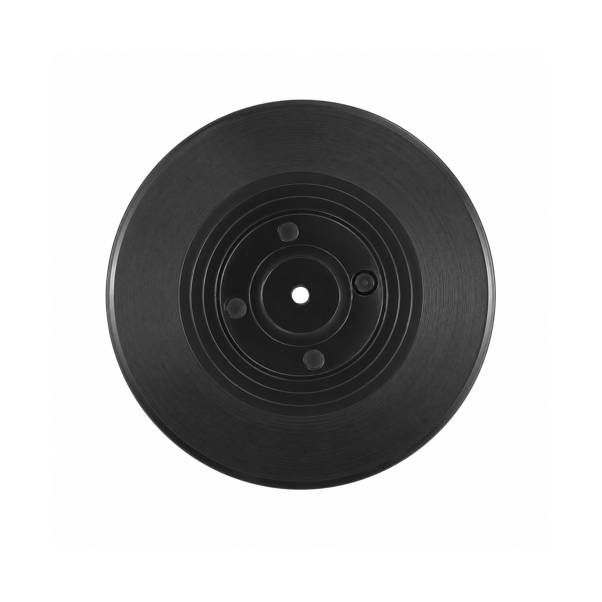 A black coaster designed to resemble a vinyl record, featuring grooves and a central hole.