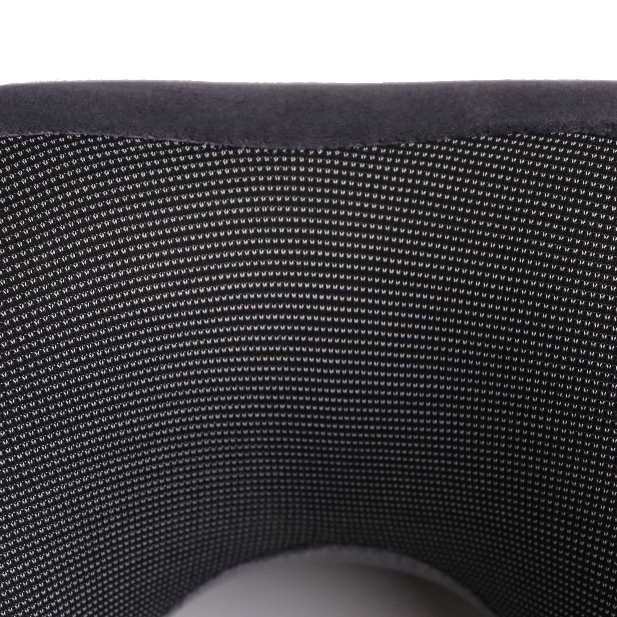 A U-shaped travel pillow in black with a soft, textured surface and mesh lining. Features branding on the exterior.