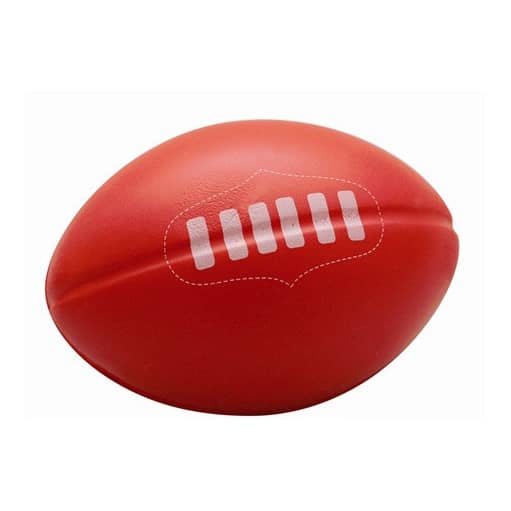 A red stress ball shaped like an Australian football, featuring white stitching details and a logo.