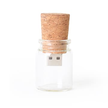 A glass bottle with a cork stopper containing a USB flash drive. The bottle is clear with a natural cork top.