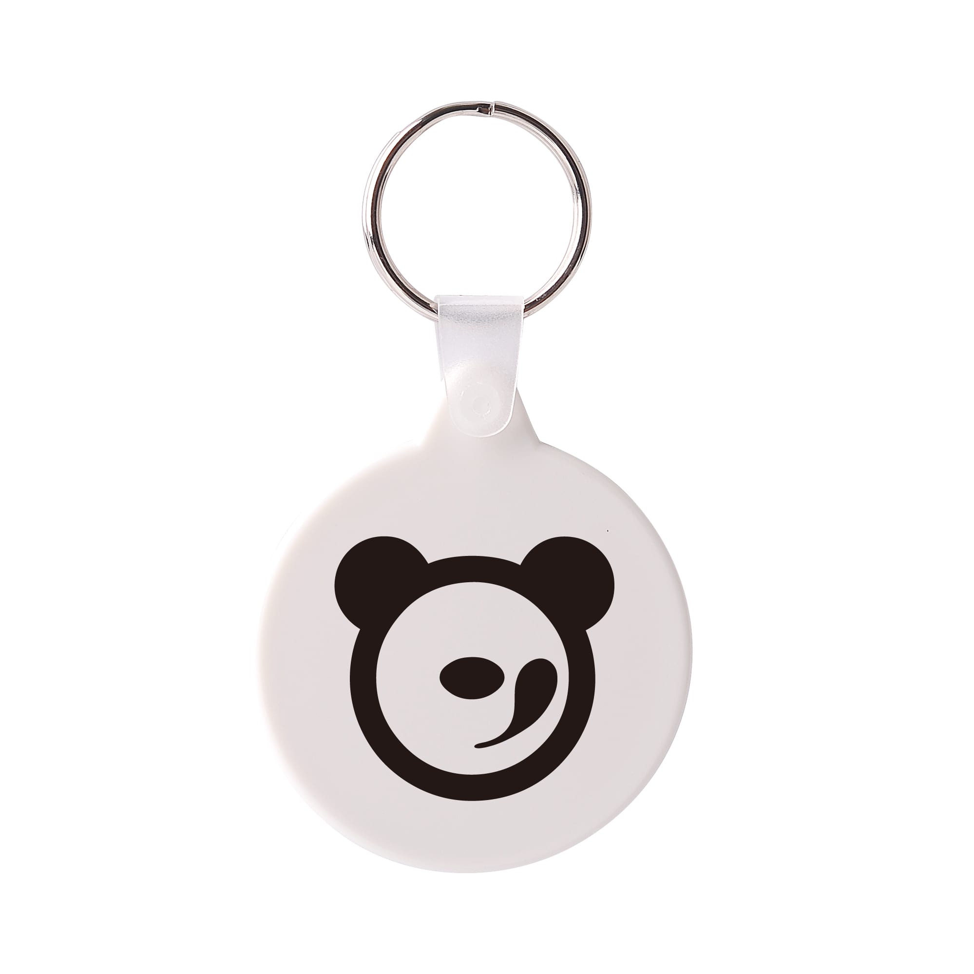 A round hard plastic keyring in white with a black bear logo and a silver keyring attachment.