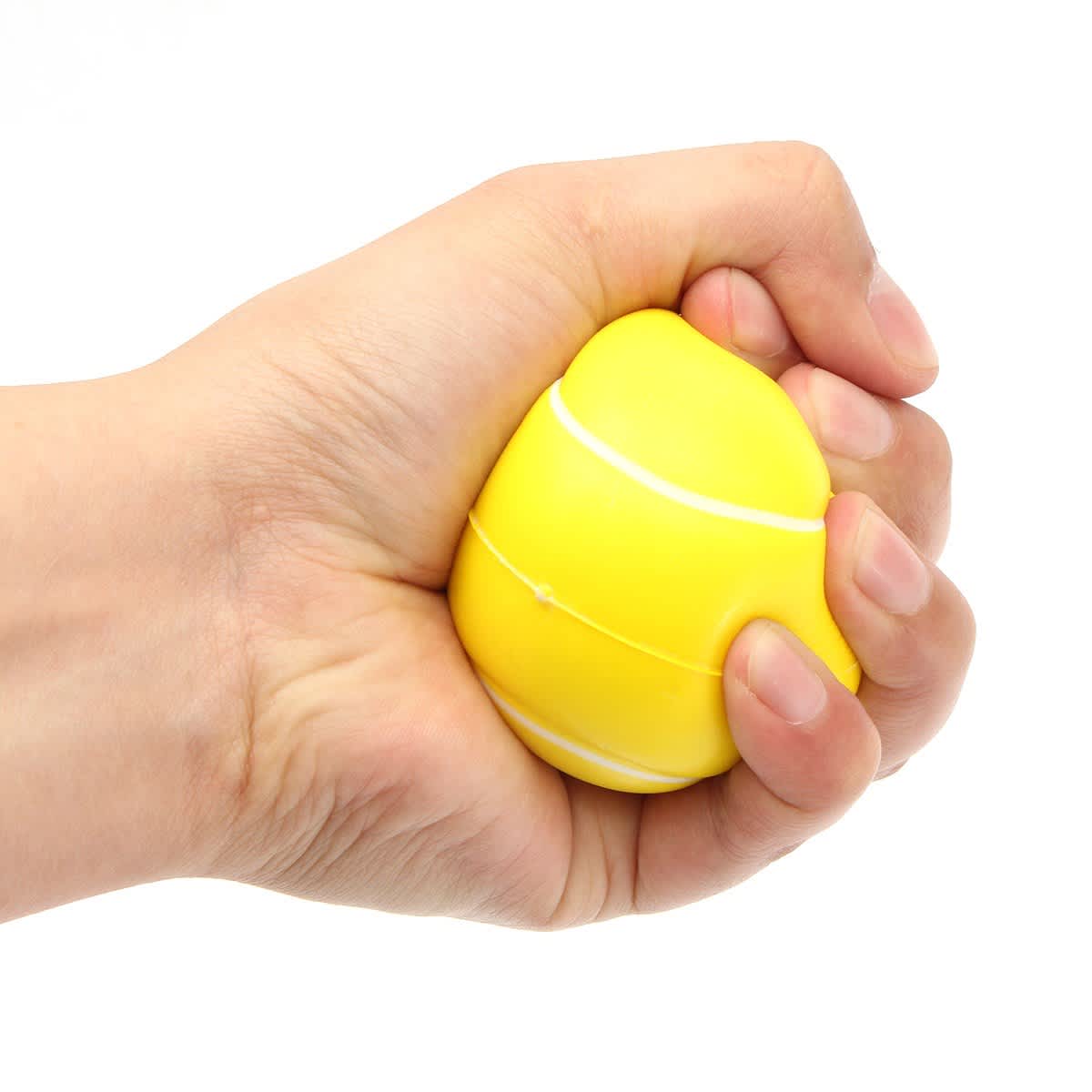A yellow tennis-shaped stress reliever being squeezed in a hand, designed for fun and stress relief.
