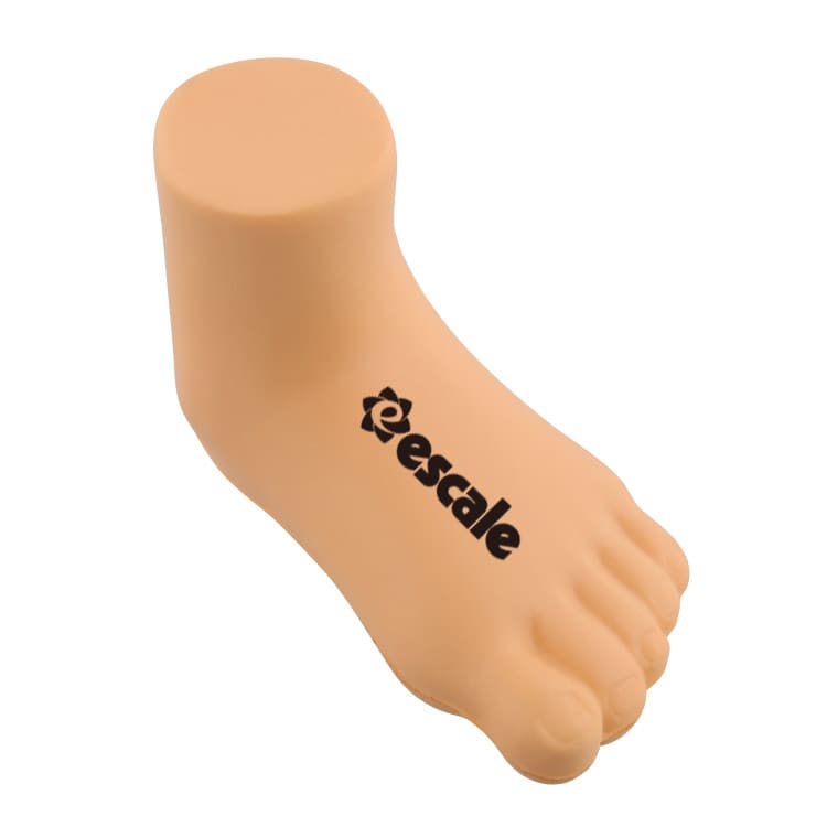 A beige stress reliever in the shape of a baby foot, featuring a logo on the side.