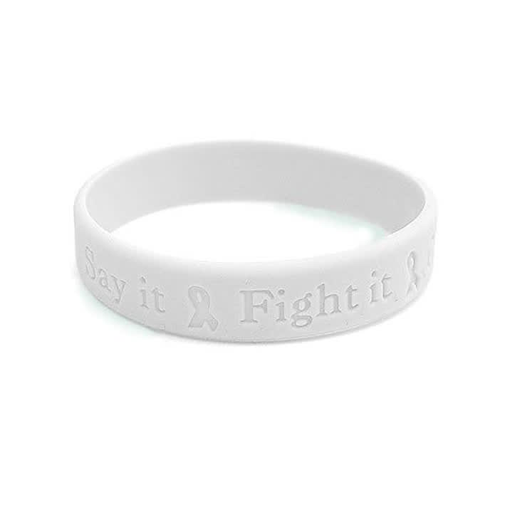 A white debossed wristband featuring a logo and embossed text on its surface.