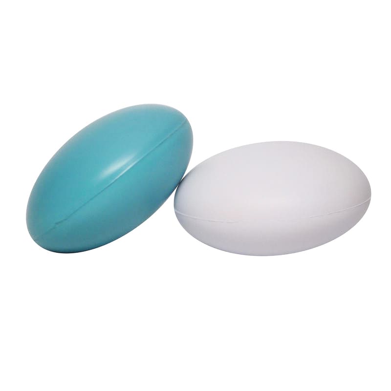 A tablet-shaped stress reliever in teal and white, featuring a smooth, rounded design. It has a logo on one side.