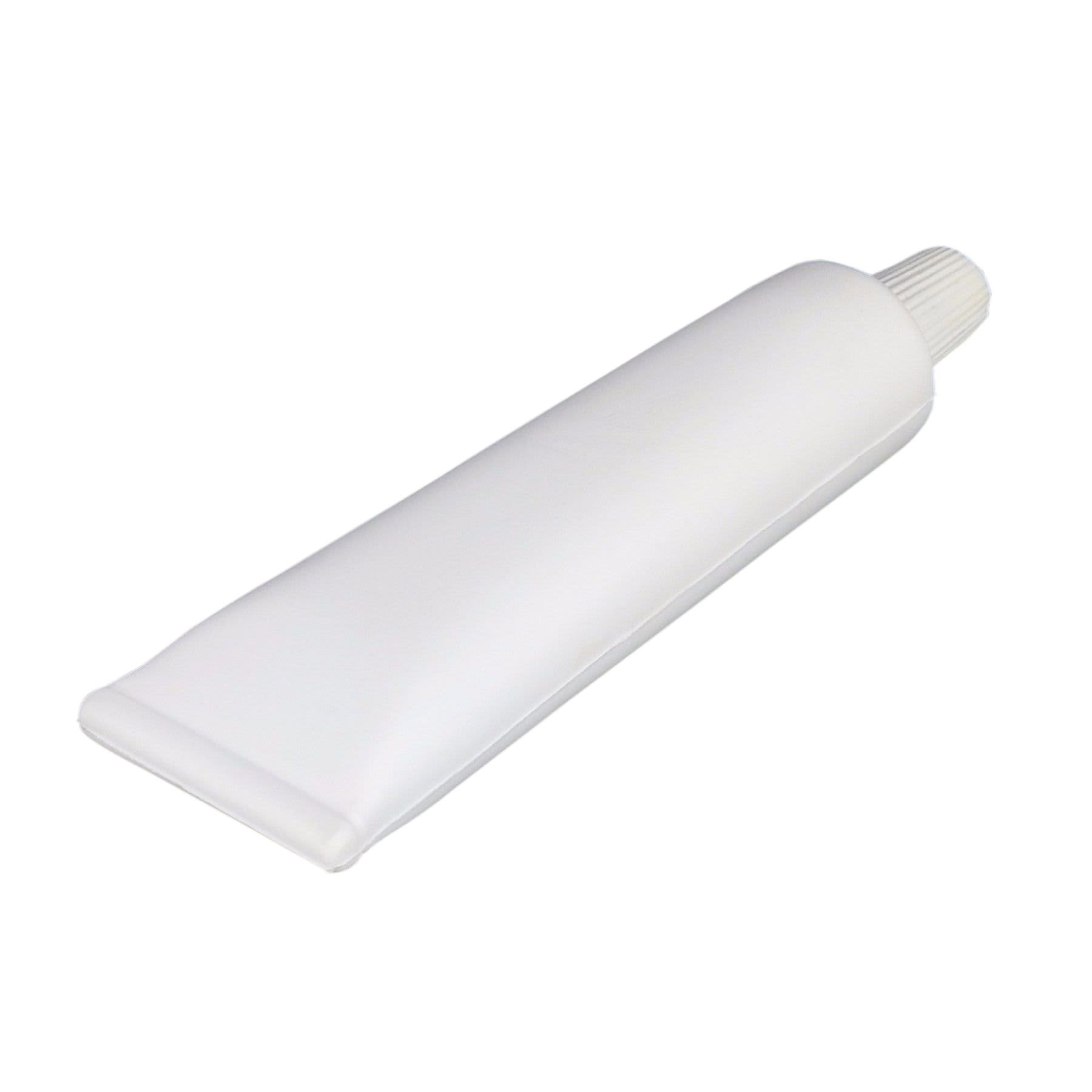 A large white toothpaste-shaped stress reliever with a ribbed nozzle. Features a logo on the surface.
