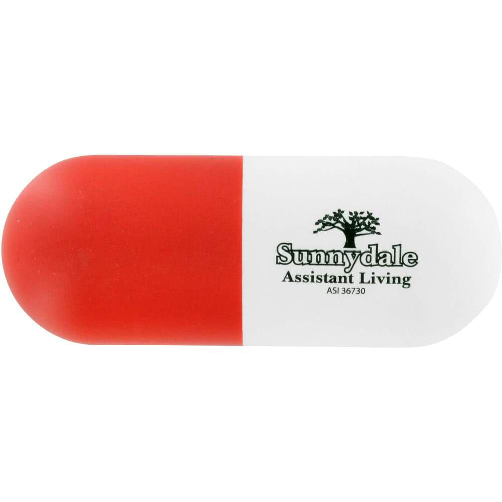 A capsule-shaped stress reliever in red and white with a logo on one side.