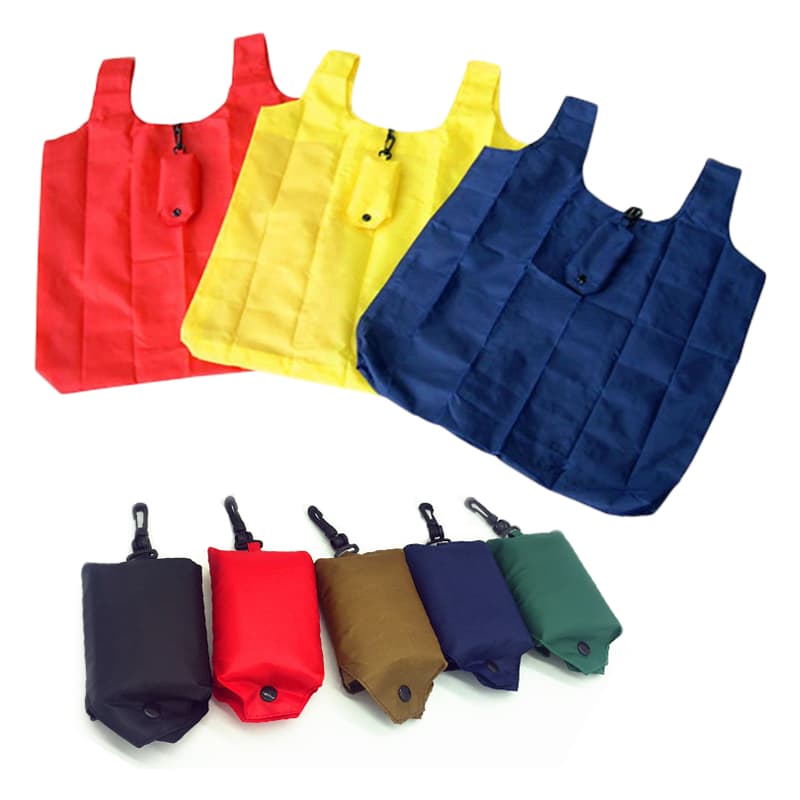 A collection of compact foldable shopping tote bags in red, yellow, navy, and various coloured pouches for storage.