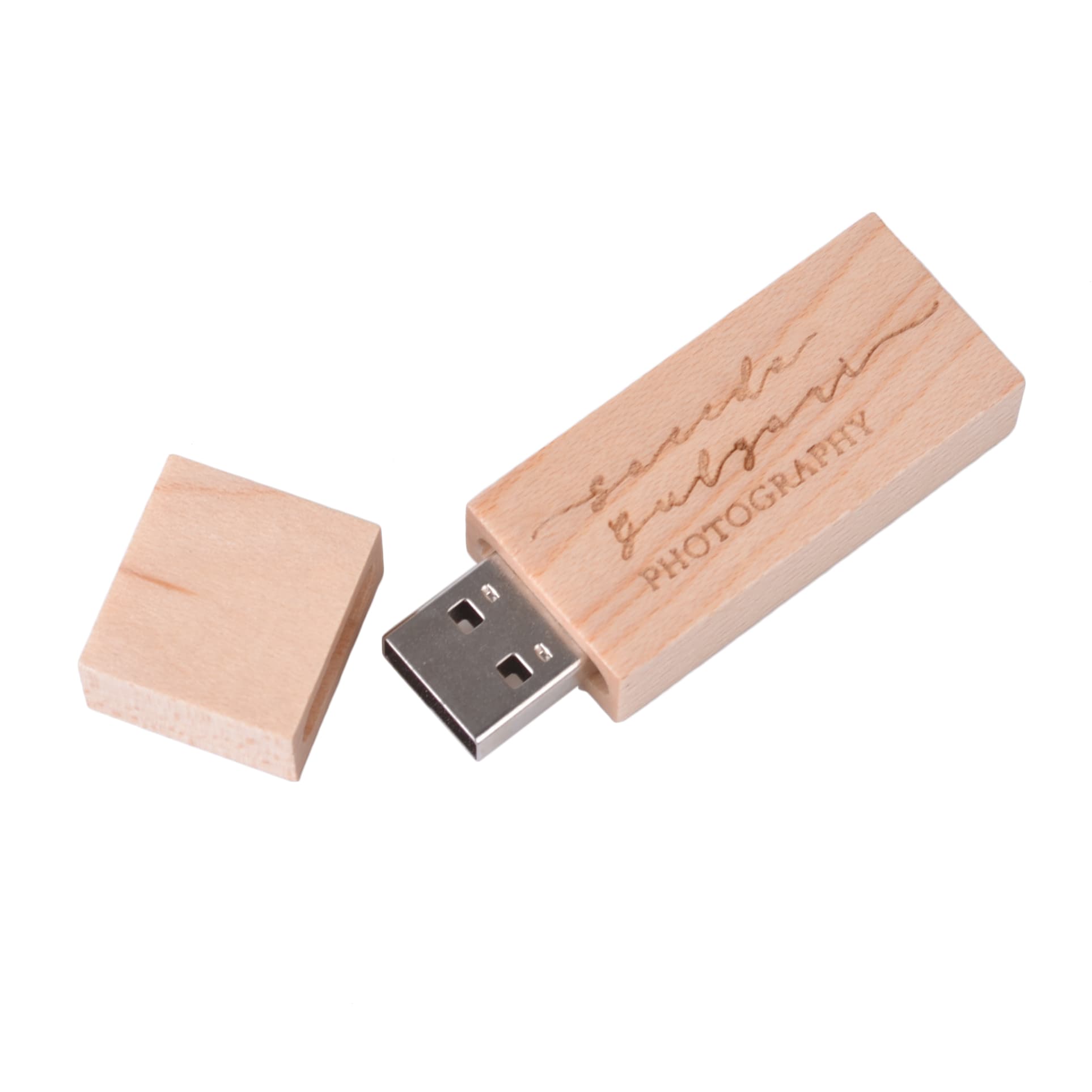 A wooden rectangle flash drive in light wood, featuring a removable cap and a logo engraved on its surface.