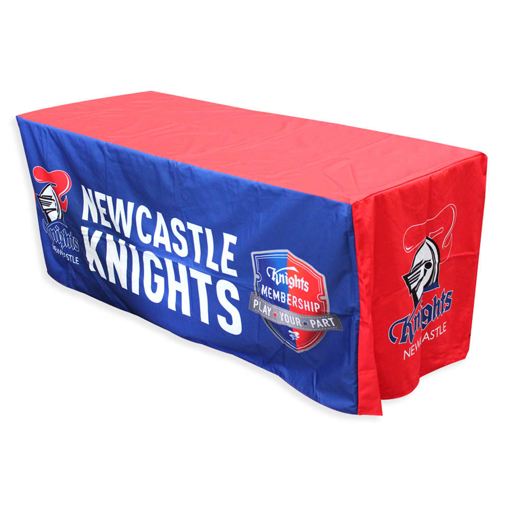 A fitted tablecloth in blue and red, featuring a logo and promotional text for Newcastle Knights.