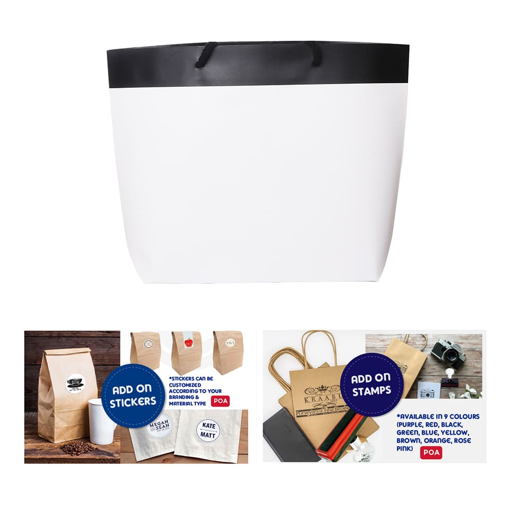 A small black and white boutique paper bag with handles, featuring a plain design and a logo.