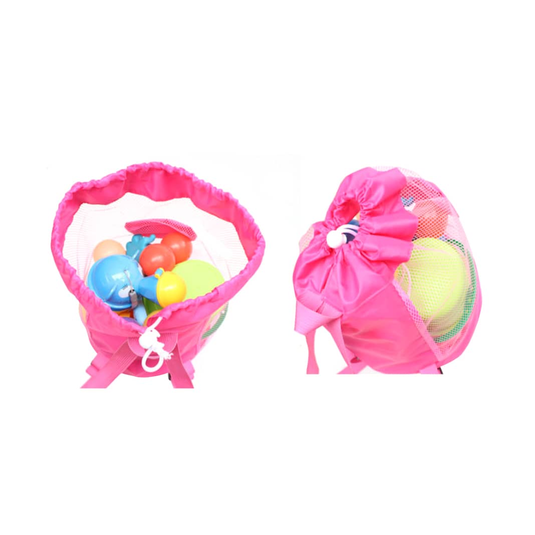 A pink foldable mesh drawstring backpack containing colourful balls and toys, featuring a drawstring closure and a logo.