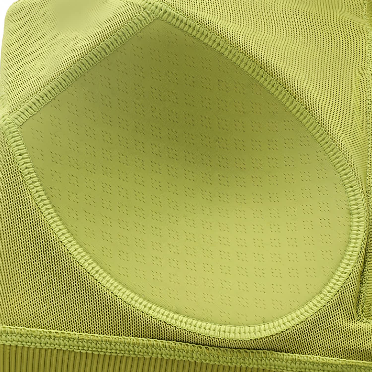 A close-up of a light green women's zip-front racerback yoga crop bra tank featuring textured detailing and a logo.