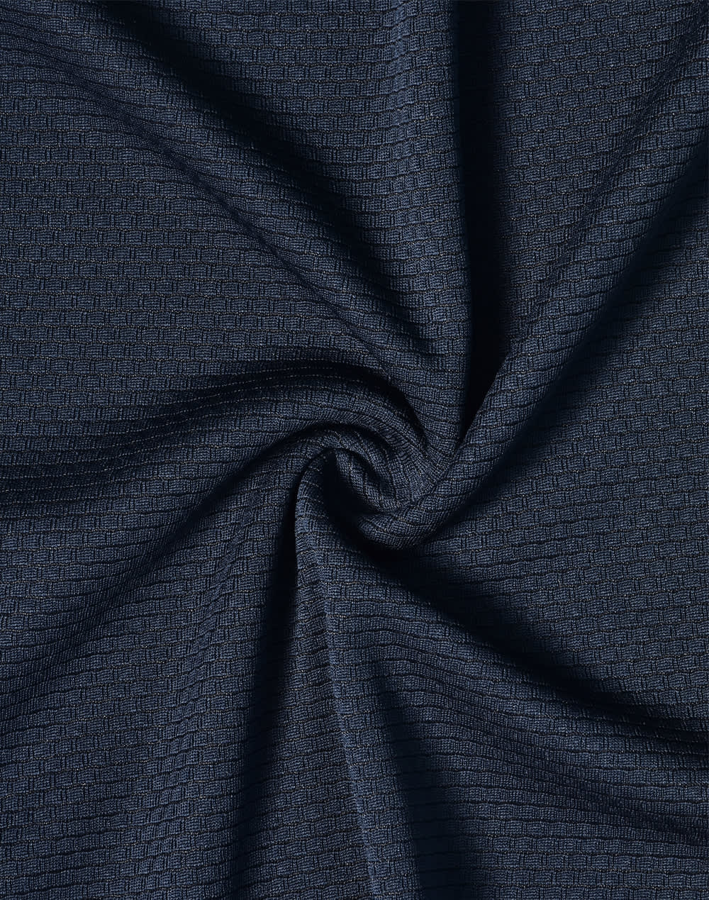 A textured fabric in a deep navy blue shade, showcasing a subtle pattern and soft, breathable quality.