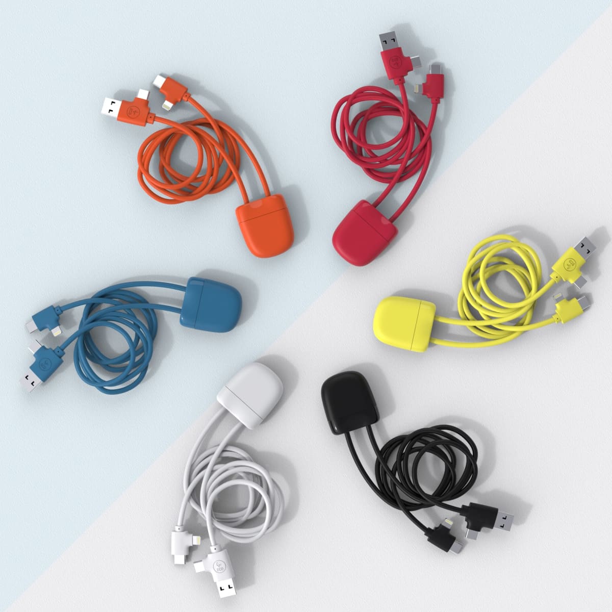 A collection of six charging cables in various colours, featuring rounded connectors and each with a logo.