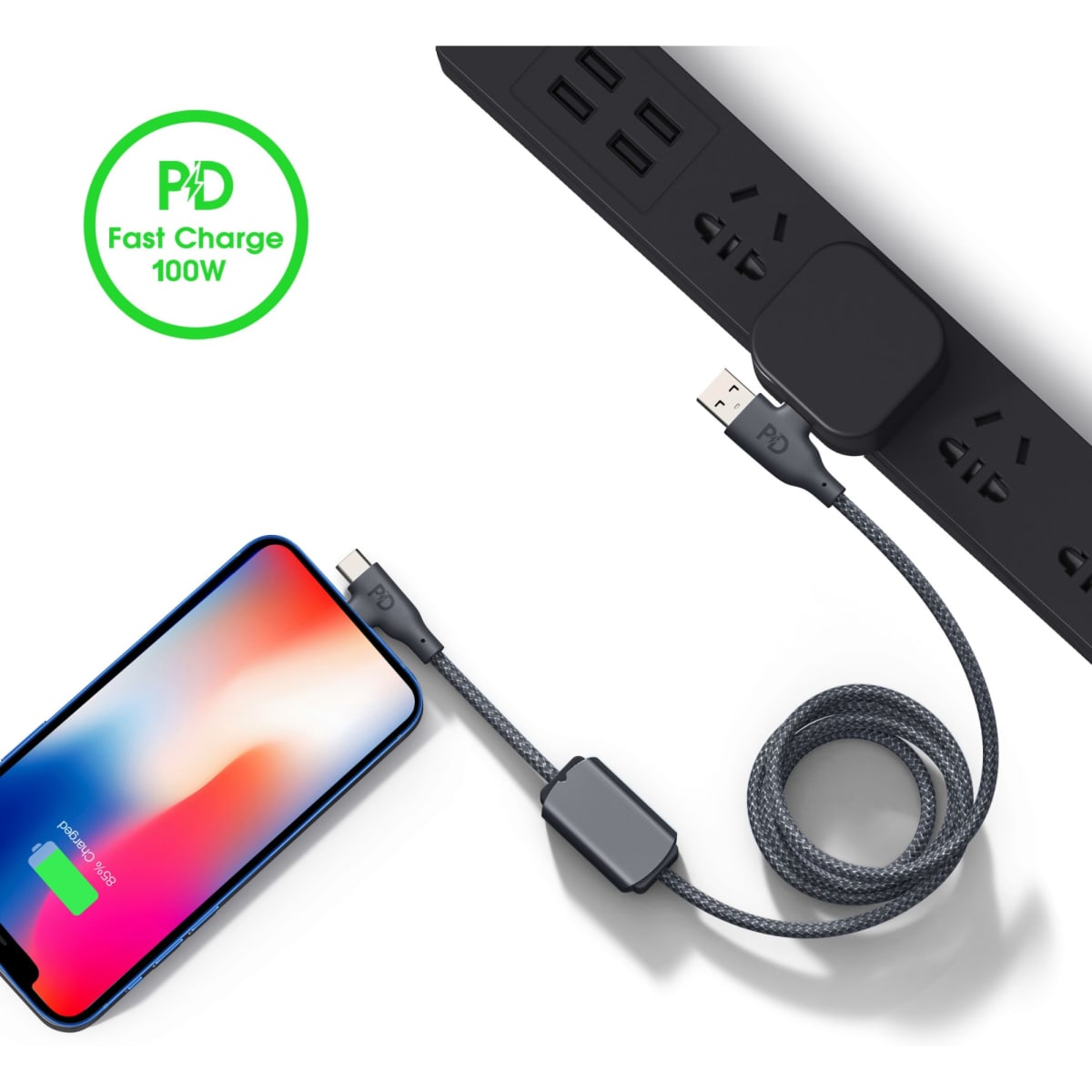 A grey charging cable connected to a phone and a power outlet, featuring a sleek design and branding.