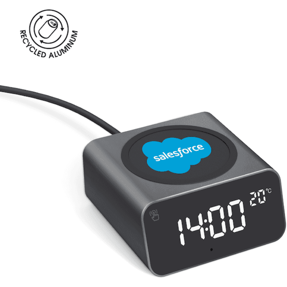 A grey wireless charger and alarm clock made from recycled aluminium, featuring a logo and displaying the time and temperature.