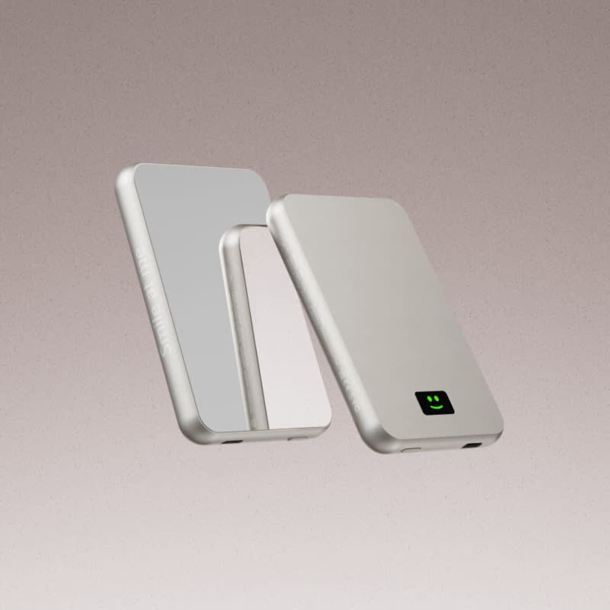 A silver 5000mAh power bank with a mirrored finish and a logo. Features USB ports for charging.
