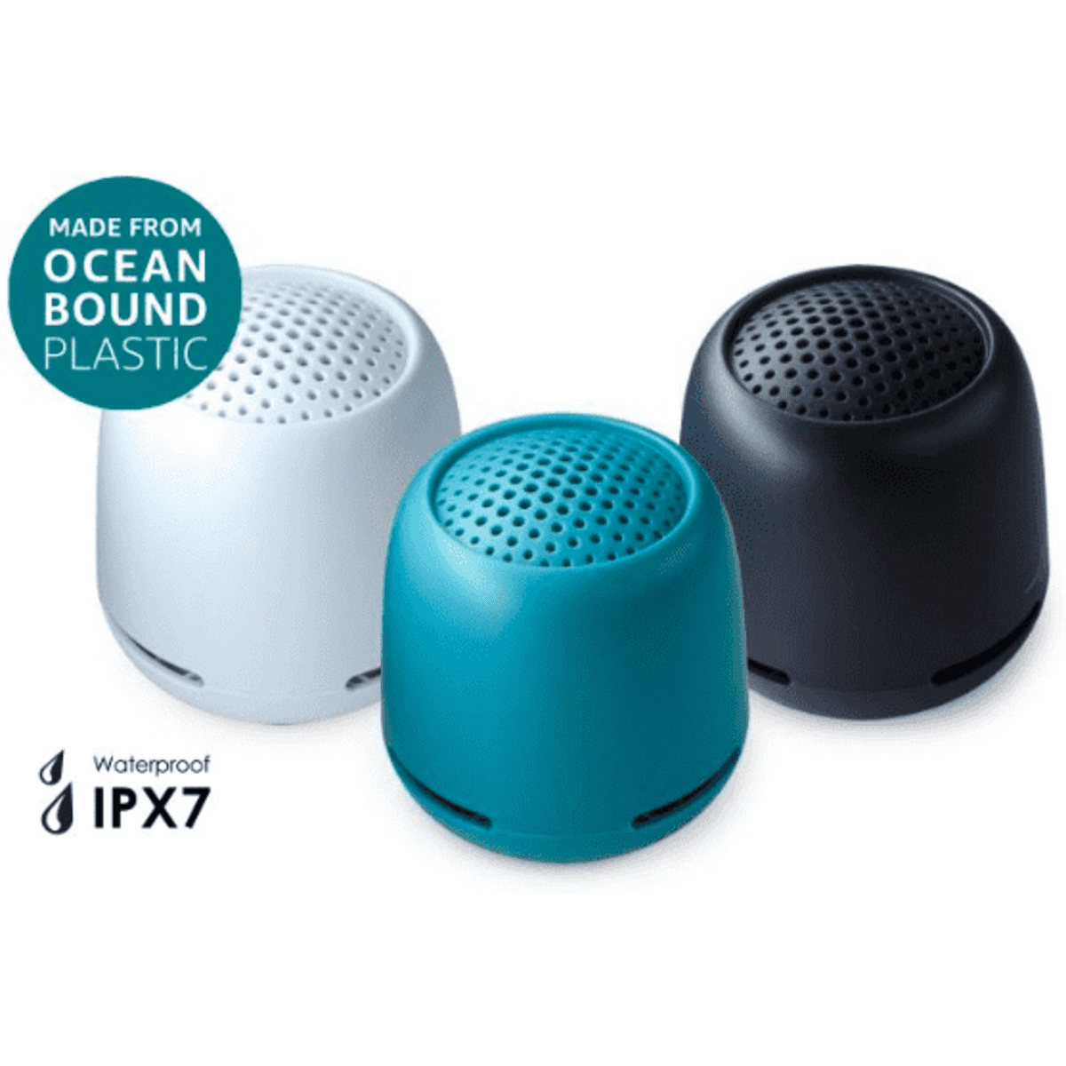 Three small Bluetooth speakers in white, teal, and black, made from recycled ocean-bound plastic, featuring waterproof design.