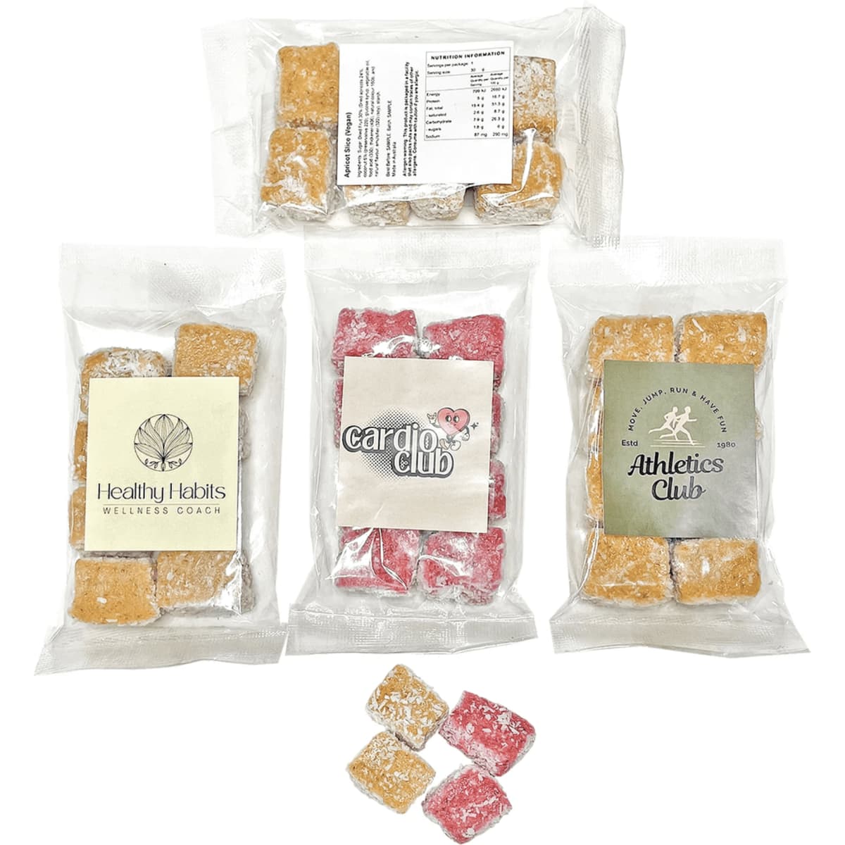 Four clear bags contain assorted dried fruit slices in orange and red, each bag labelled with a logo or branding.